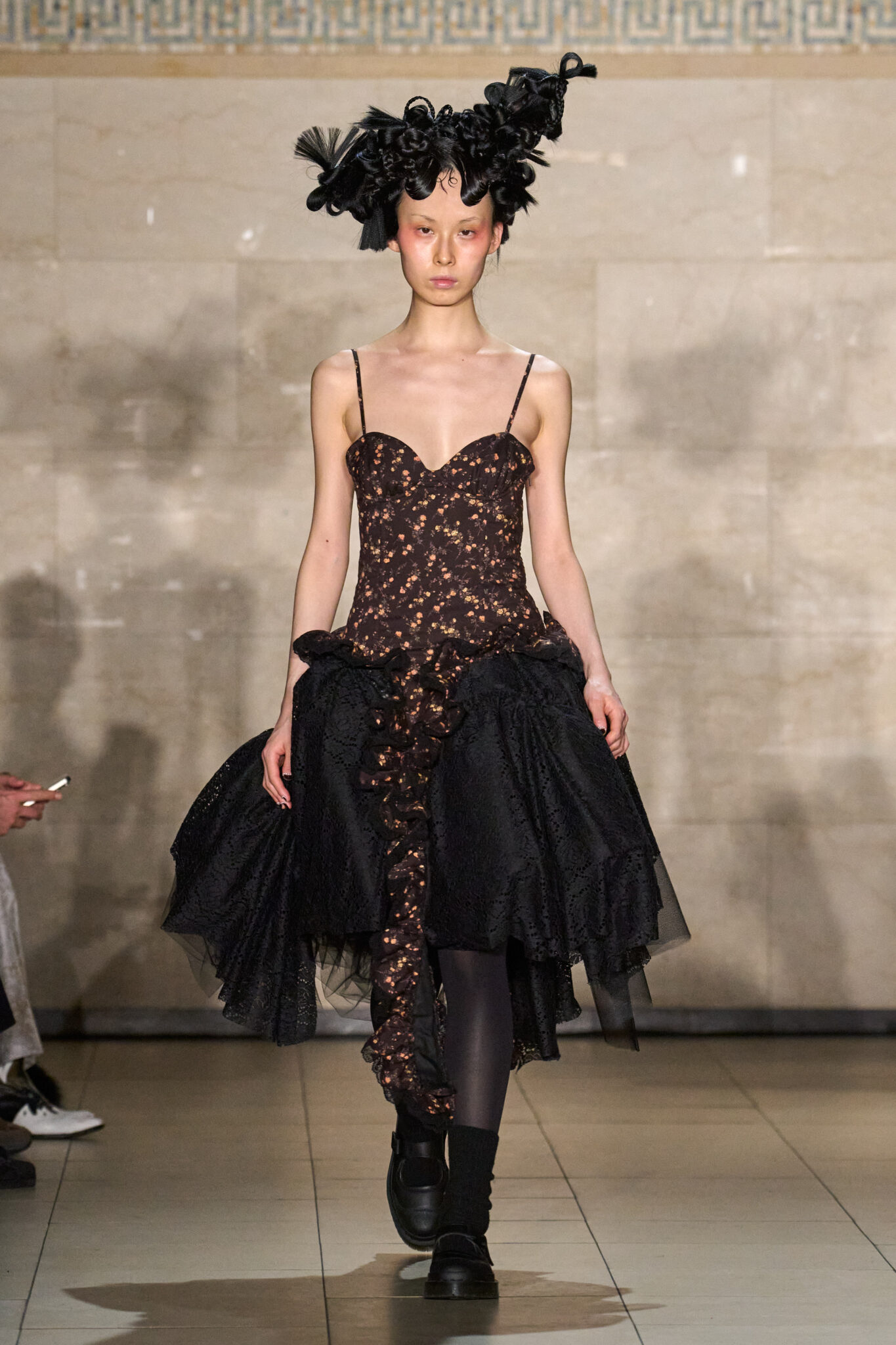 Runway look: black corset dress with a full skirt and headpiece, Meruert Tolegen Fall/Winter 2025