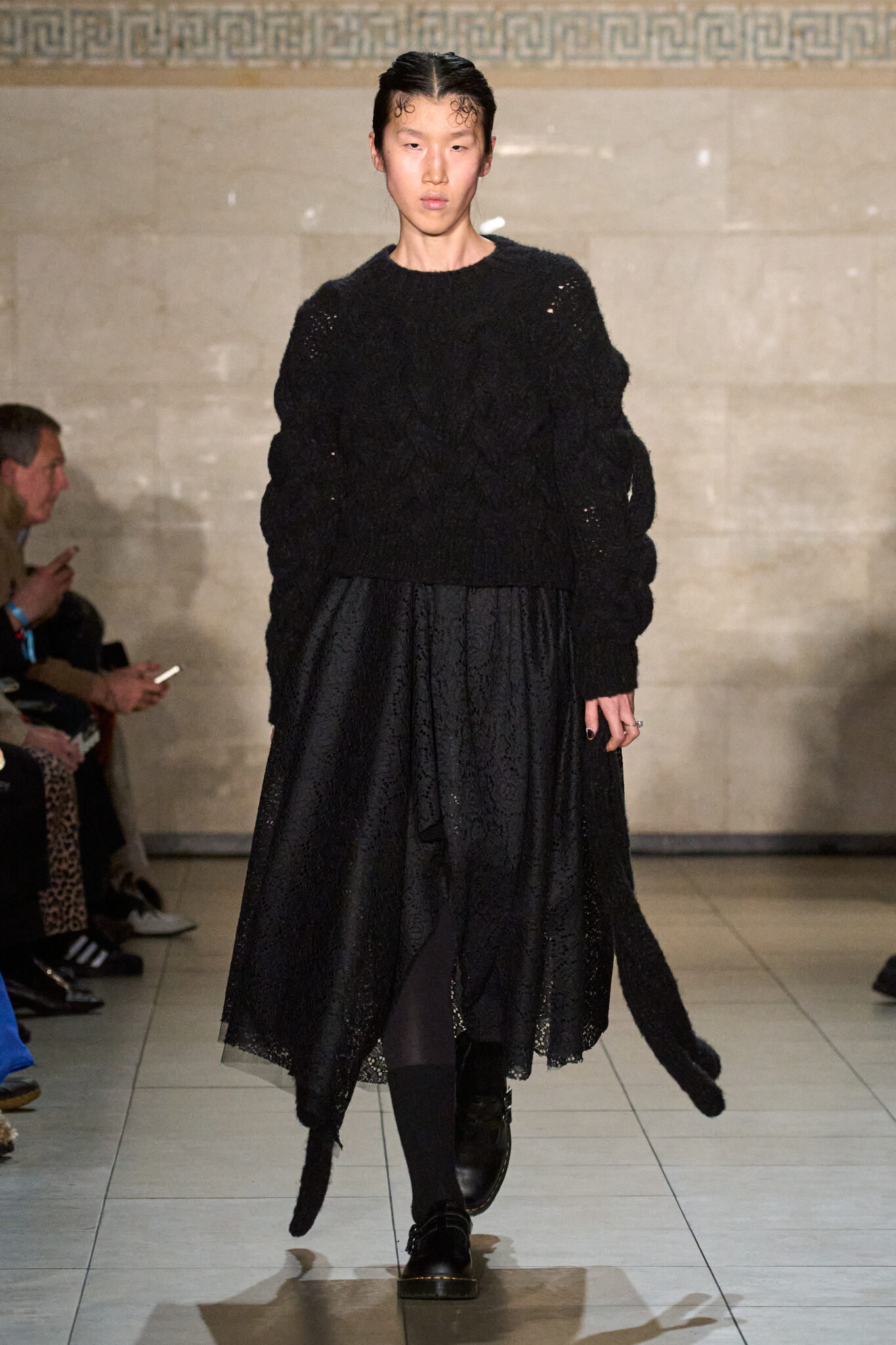Runway look: oversized black sweater with a long black skirt, Meruert Tolegen Fall/Winter 2025