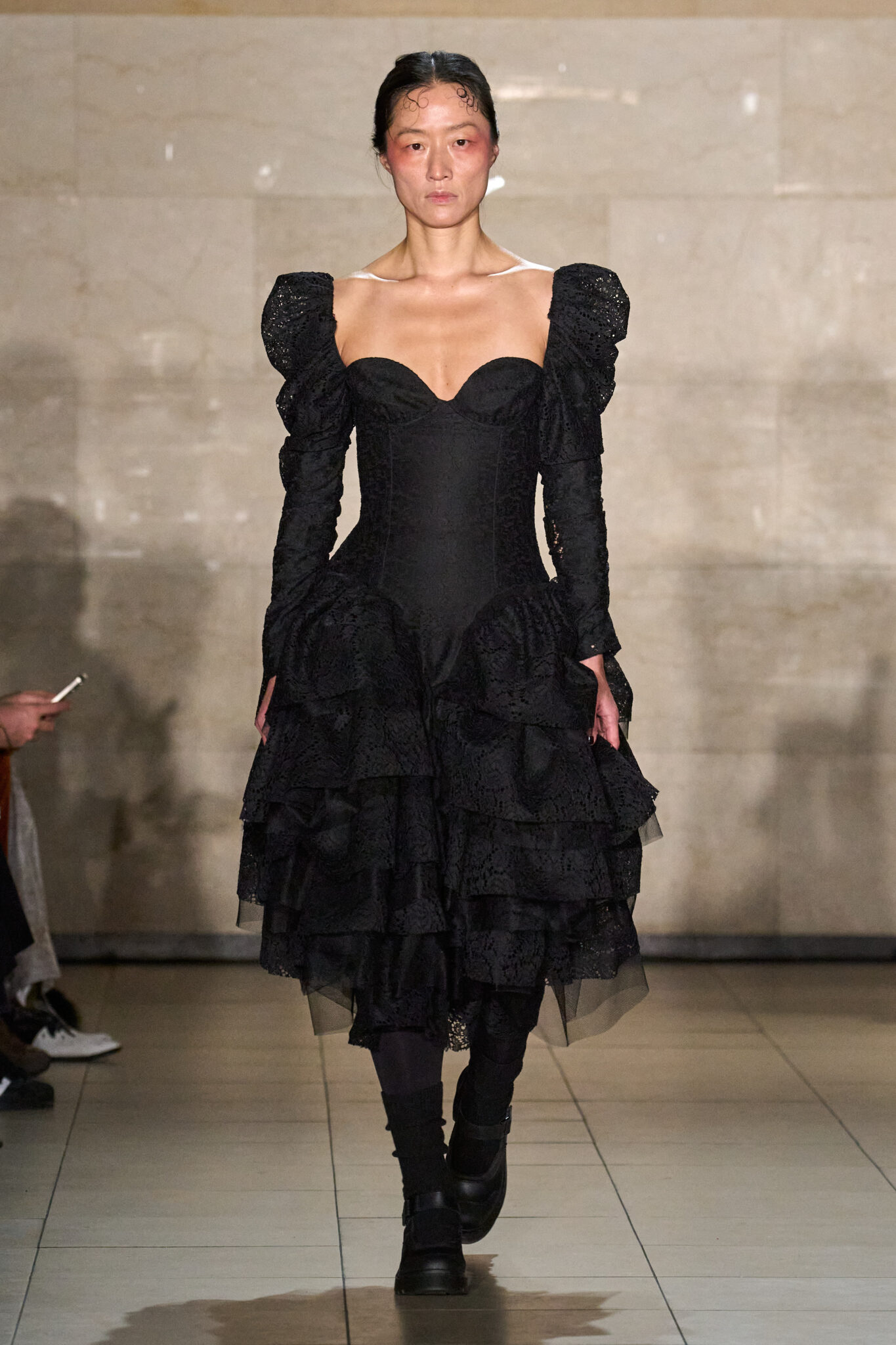 Runway look: black puff-sleeve ruffled dress, Meruert Tolegen Fall/Winter 2025